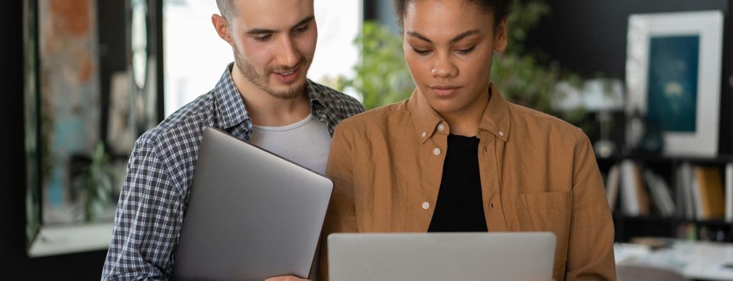 resized_two_people_office_1050x403